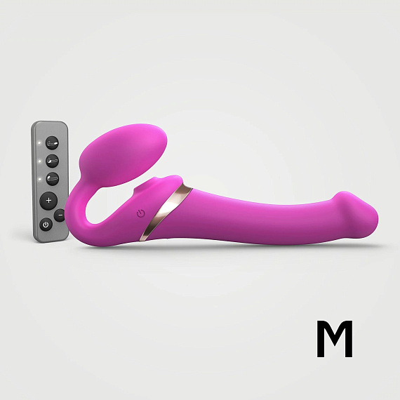 Ярко-розовый безремневой страпон Multi Orgasm Size M с клиторальной стимуляцией - силикон