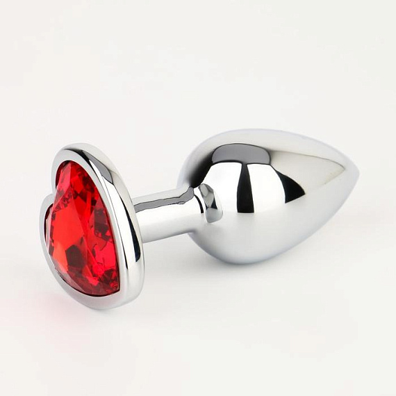 Серебристая анальная пробка с красным кристаллом в форме сердца - 7 см. - металл