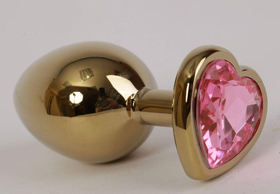 Золотистая анальная пробка с розовым стразиком-сердечком - 7,5 см. - металл