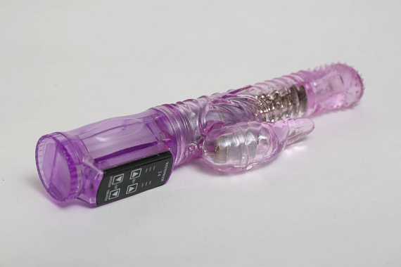 Фиолетовый силиконовый вибратор с подвижной головкой в пупырышках - 21 см. - силикон