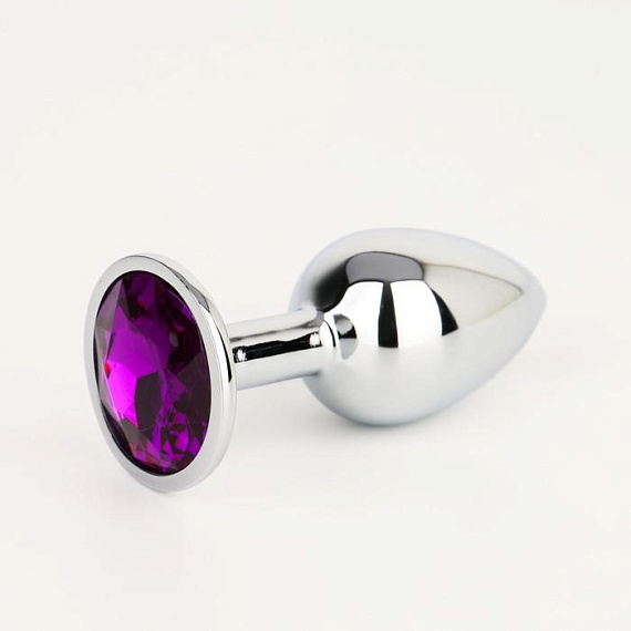 Серебристая анальная втулочка с фиолетовым кристаллом - 7 см. - металл