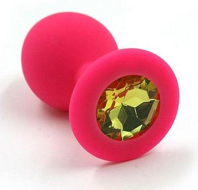 Розовая силиконовая анальная пробка с жёлтым кристаллом - 7 см.