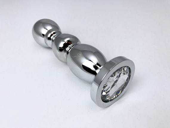 Серебристая закругленная анальная пробка-ёлочка с прозрачным кристаллом - 13 см. - металл