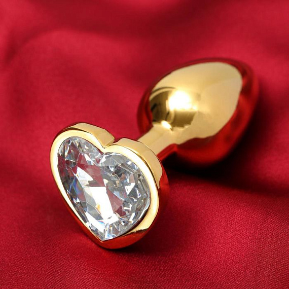 Золотистая анальная пробка с прозрачным кристаллом в форме сердца - металл