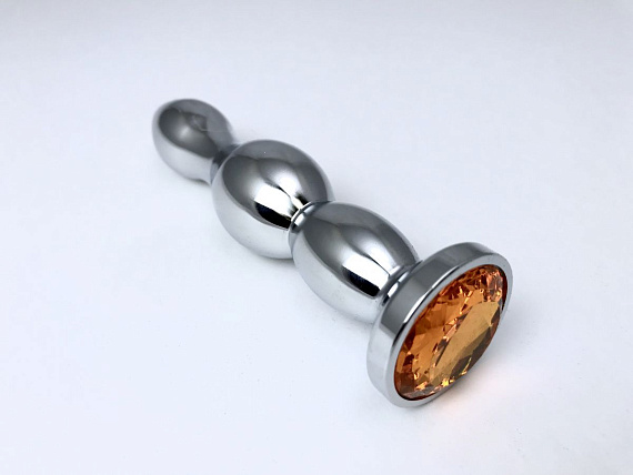Серебристая анальная пробка-ёлочка с оранжевым кристаллом - 12 см. - металл